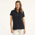 Chemise unicolor con logo y botones