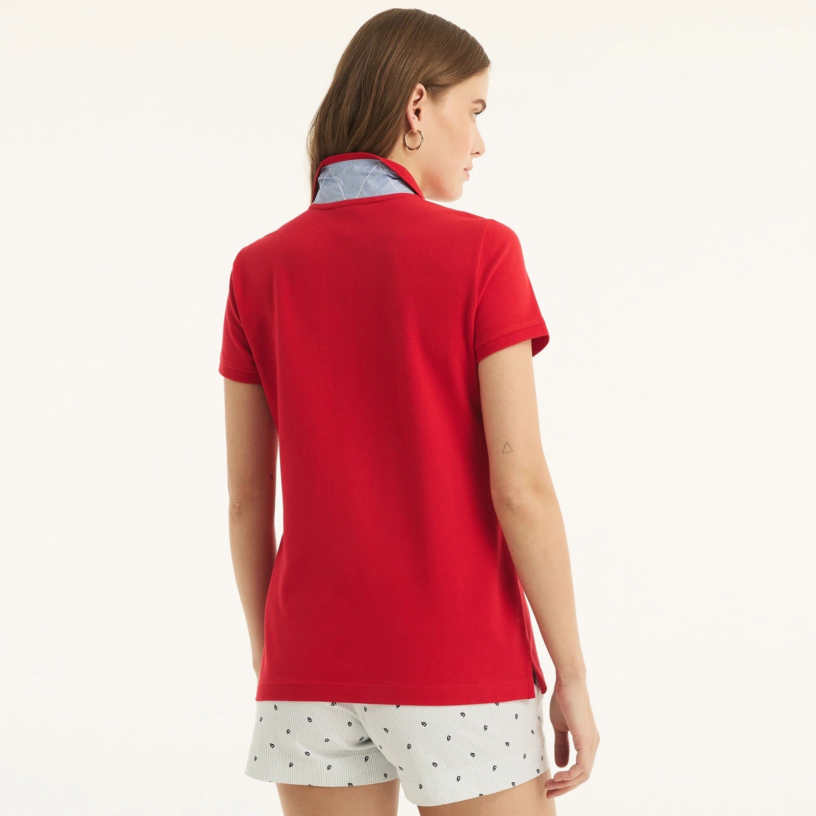 Chemise unicolor con logo y botones