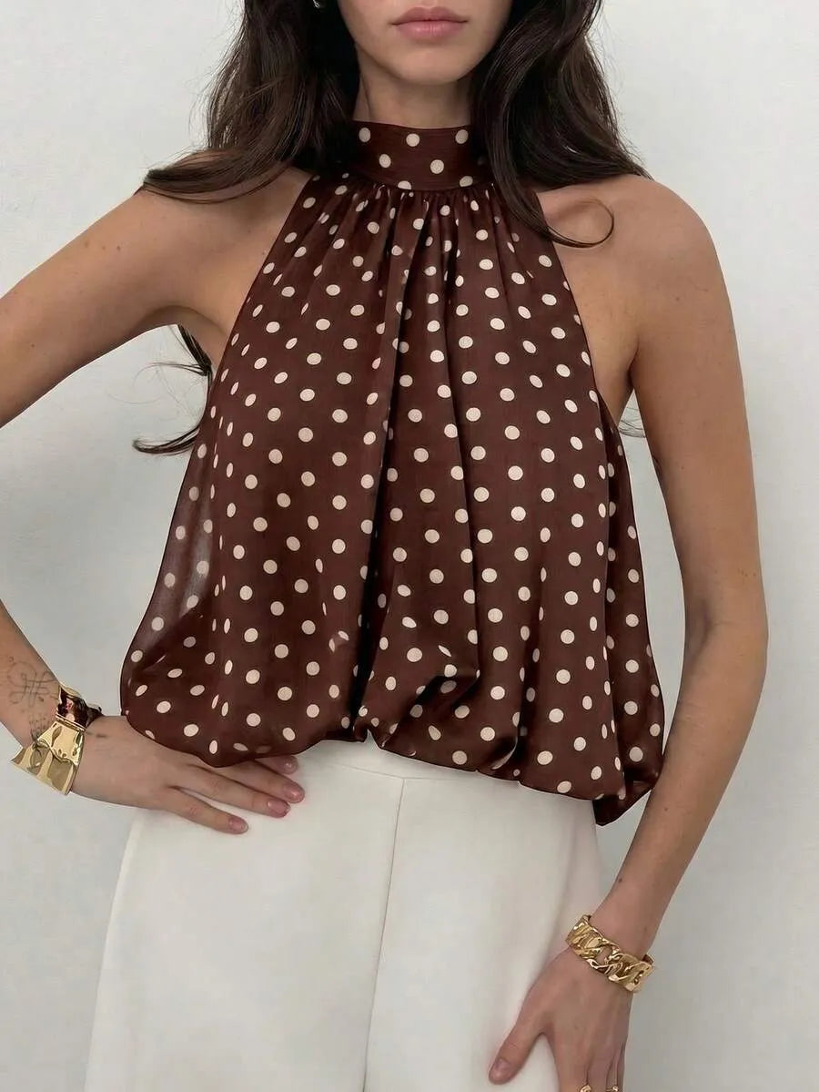 Blusa de satén con diseño de lunares