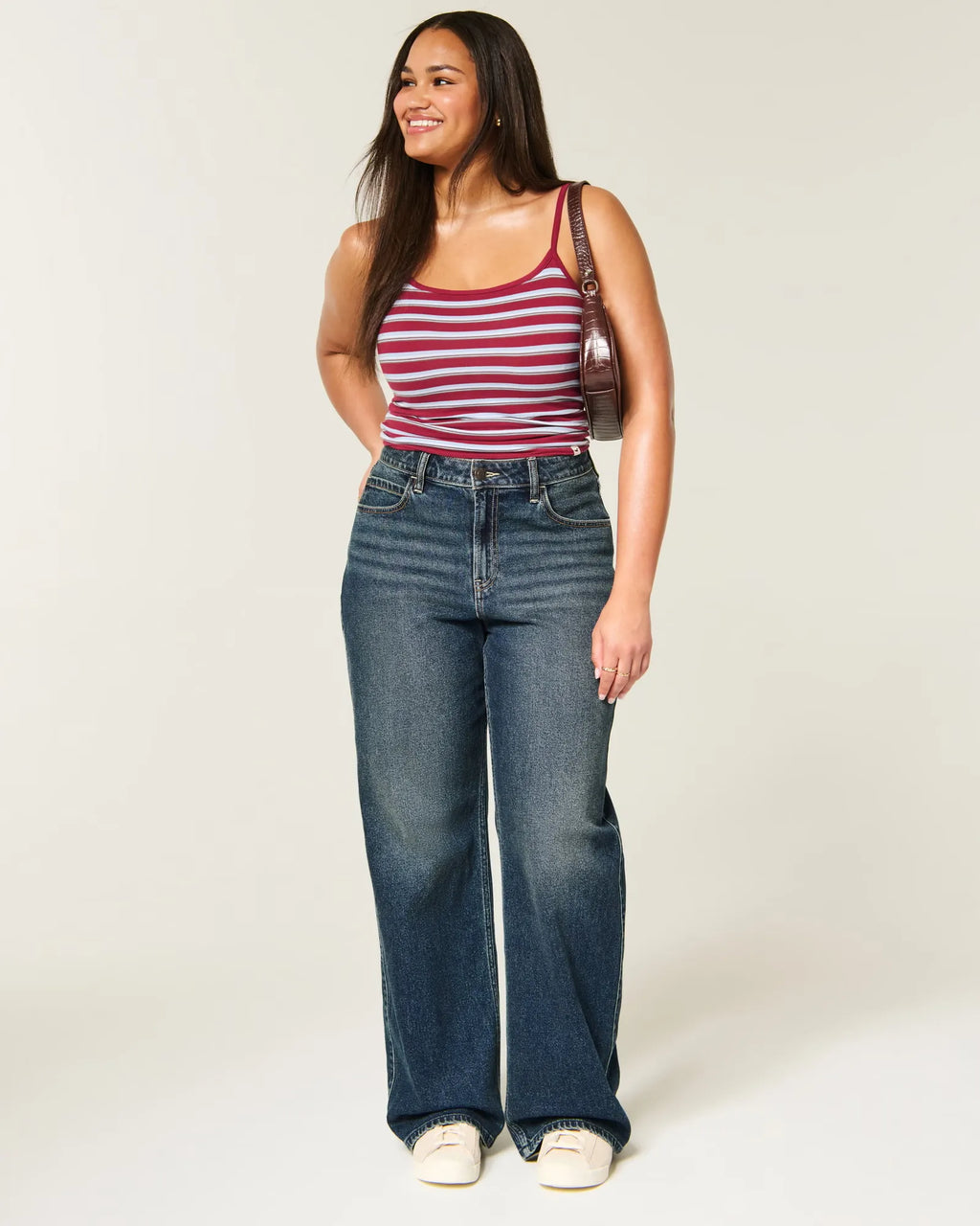Jeans anchos de tiro alto con lavado oscuro y curvas