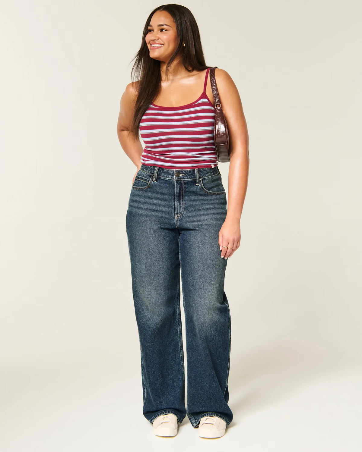 Jeans anchos de tiro alto con lavado oscuro y curvas