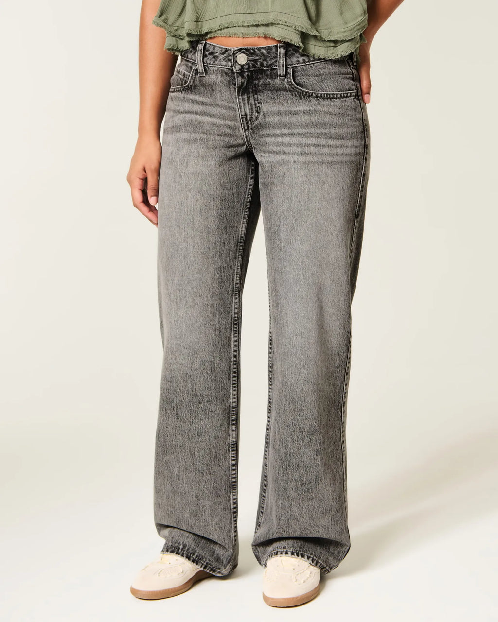 Jeans anchos de tiro alto con prelavado medio y curvas