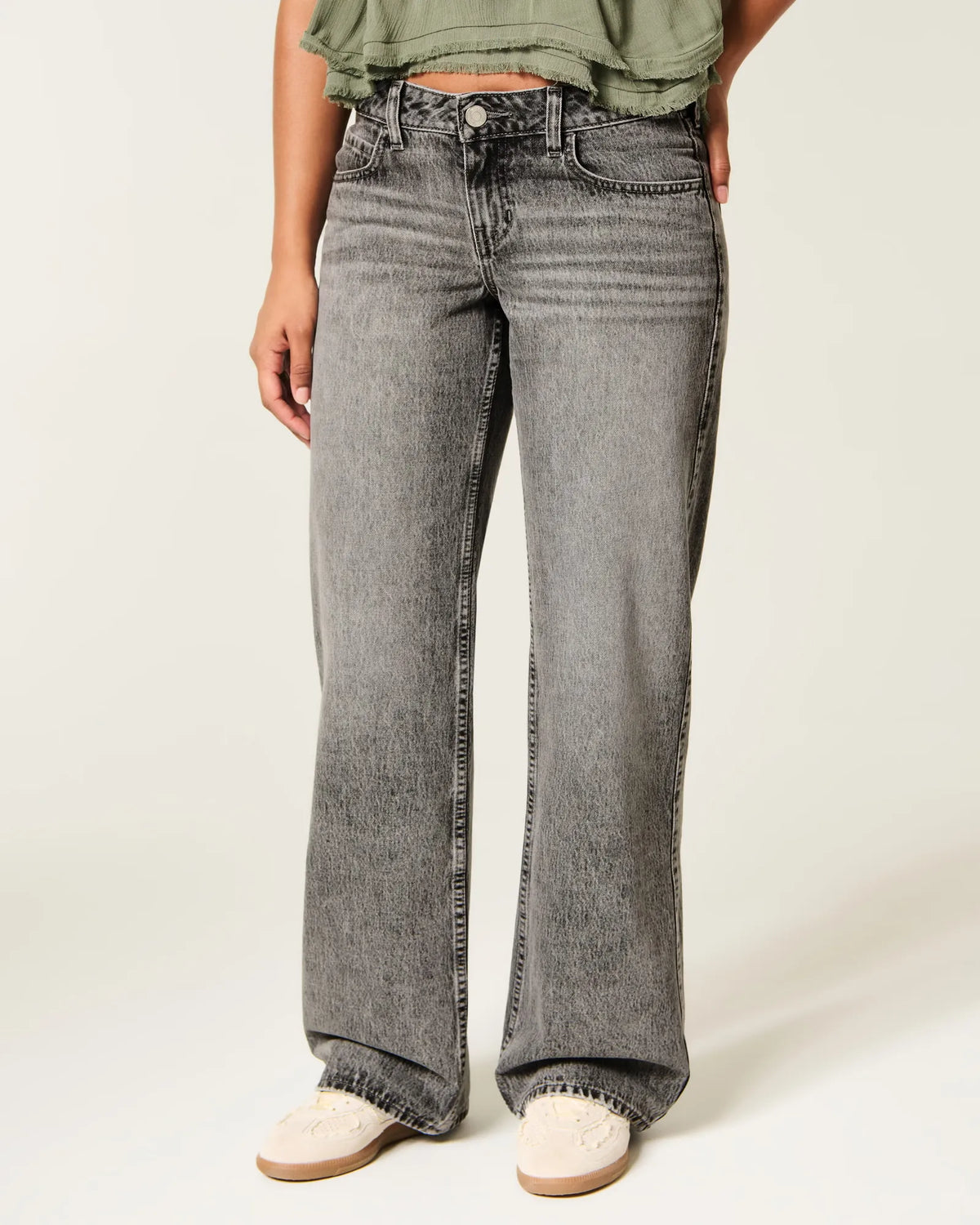 Jeans anchos de tiro alto con prelavado medio y curvas