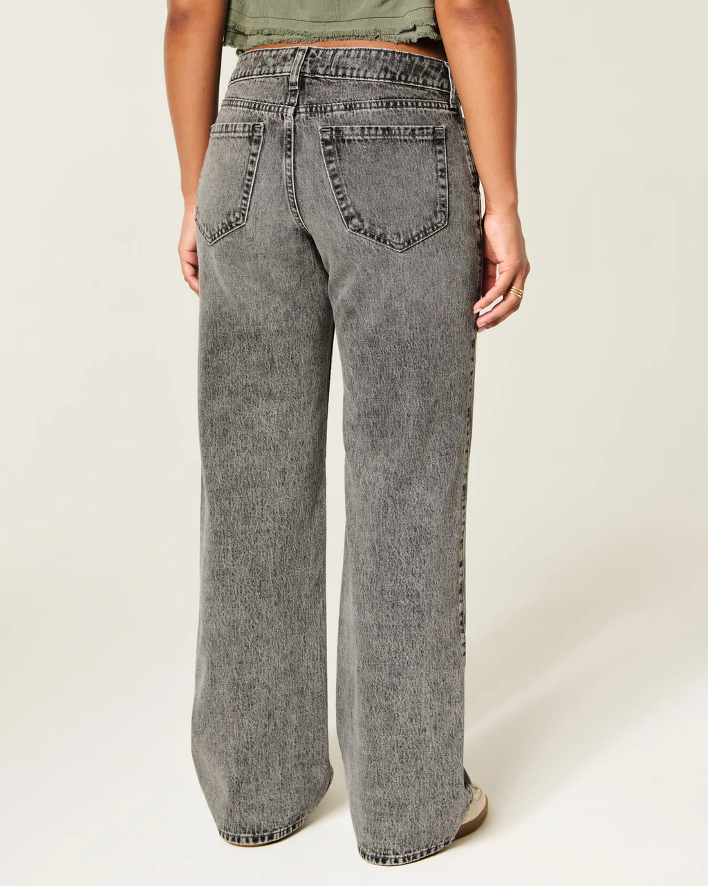 Jeans anchos de tiro alto con prelavado medio y curvas