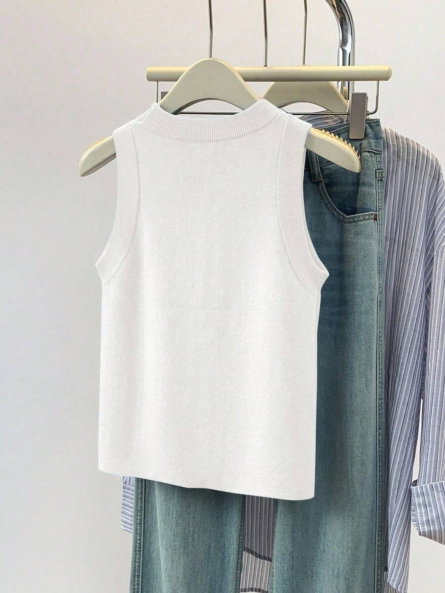 Blusa de punto sin mangas de cuello redondo