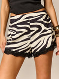 Short con estampado de cebra y encaje