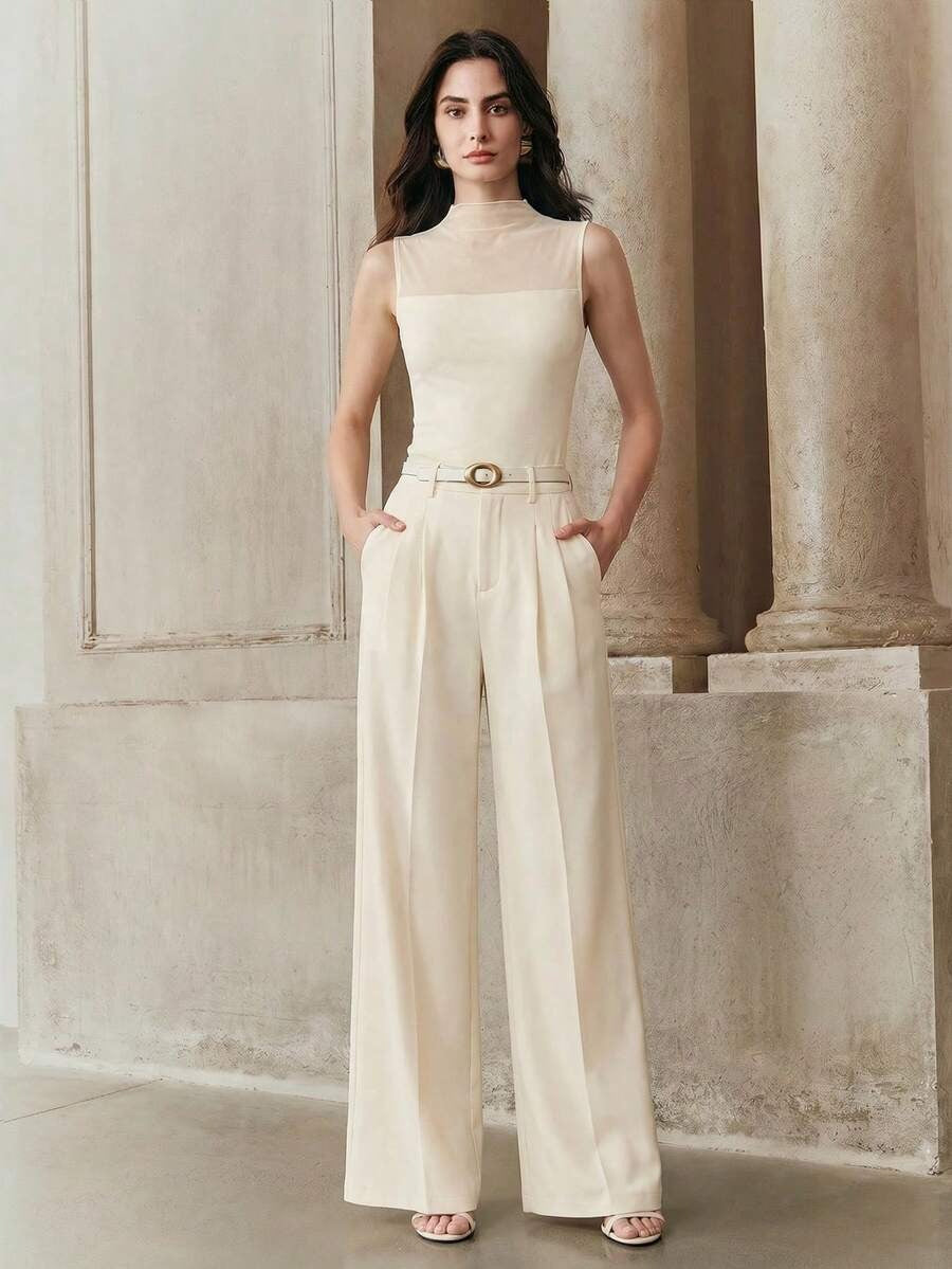 Blusa cuello alto con malla transparente