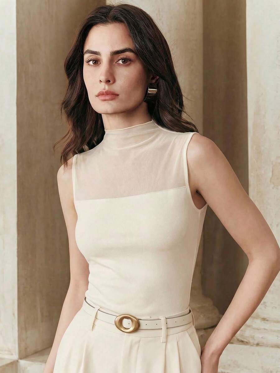 Blusa cuello alto con malla transparente