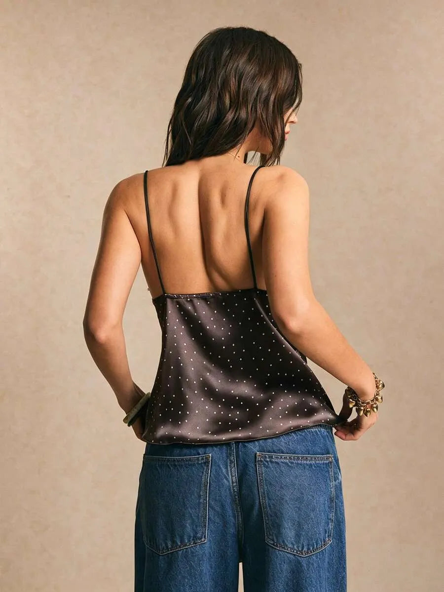 Blusa con diseño de lunares y encaje