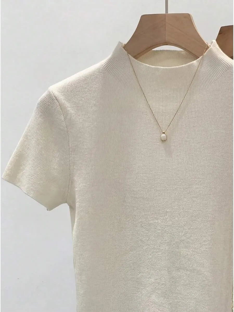 Blusa de punto con ribete de encaje