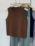 Blusa de punto sin mangas de cuello redondo