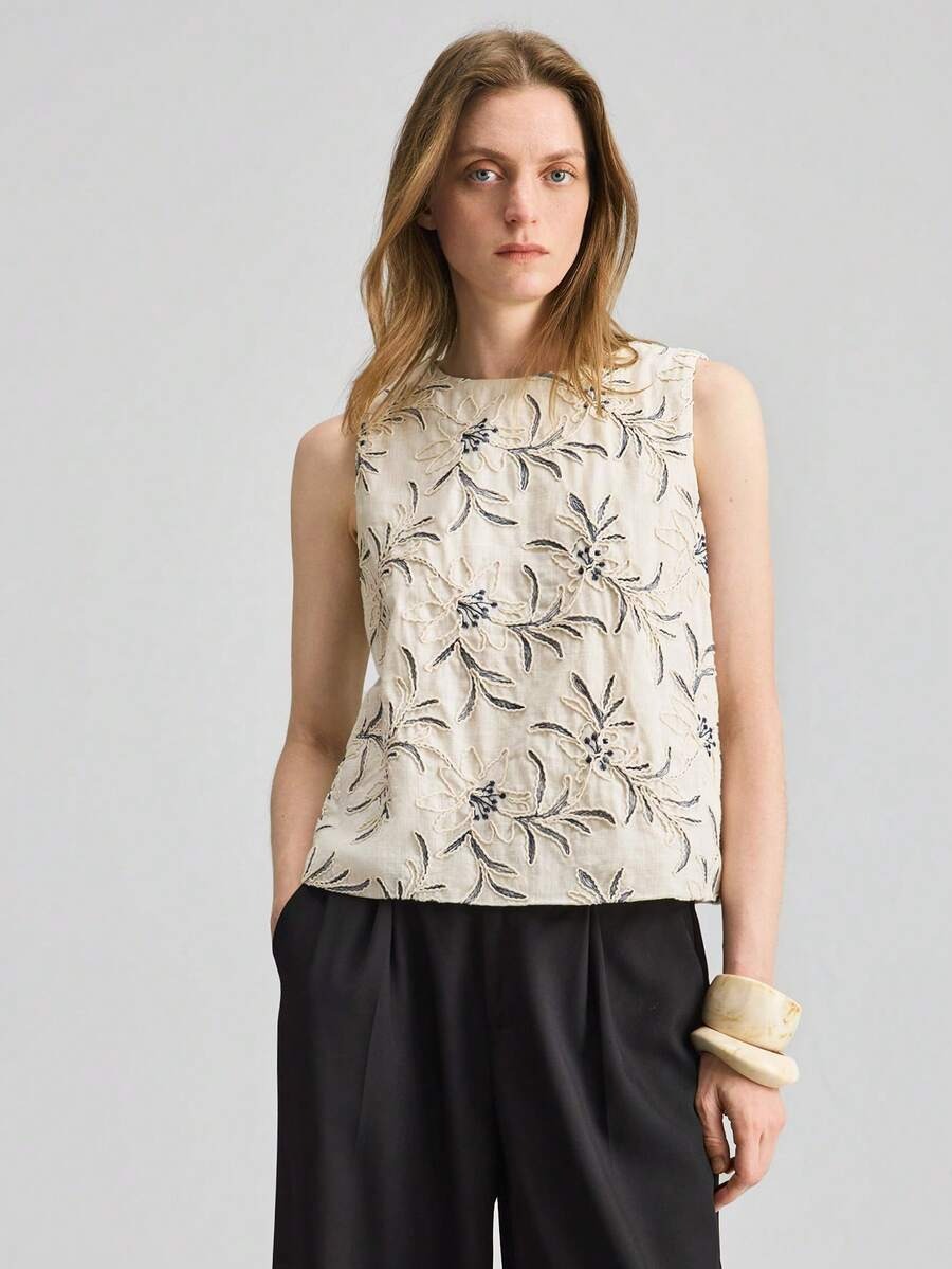 Blusa texturizada bordada