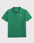 Chemise elástica unicolor con logo para niños