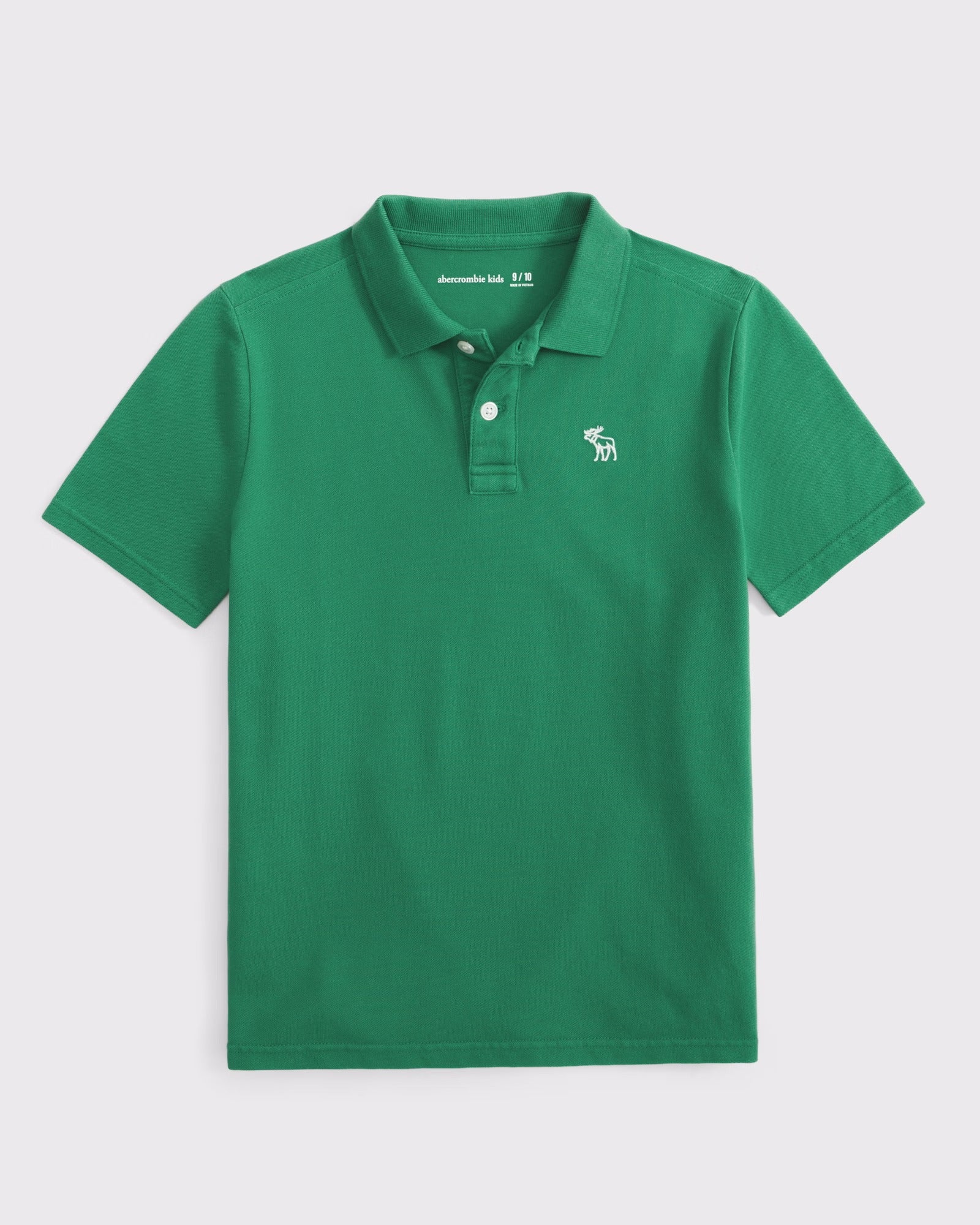 Chemise elástica unicolor con logo para niños