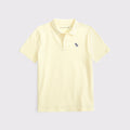 Chemise elástica unicolor con logo para niños