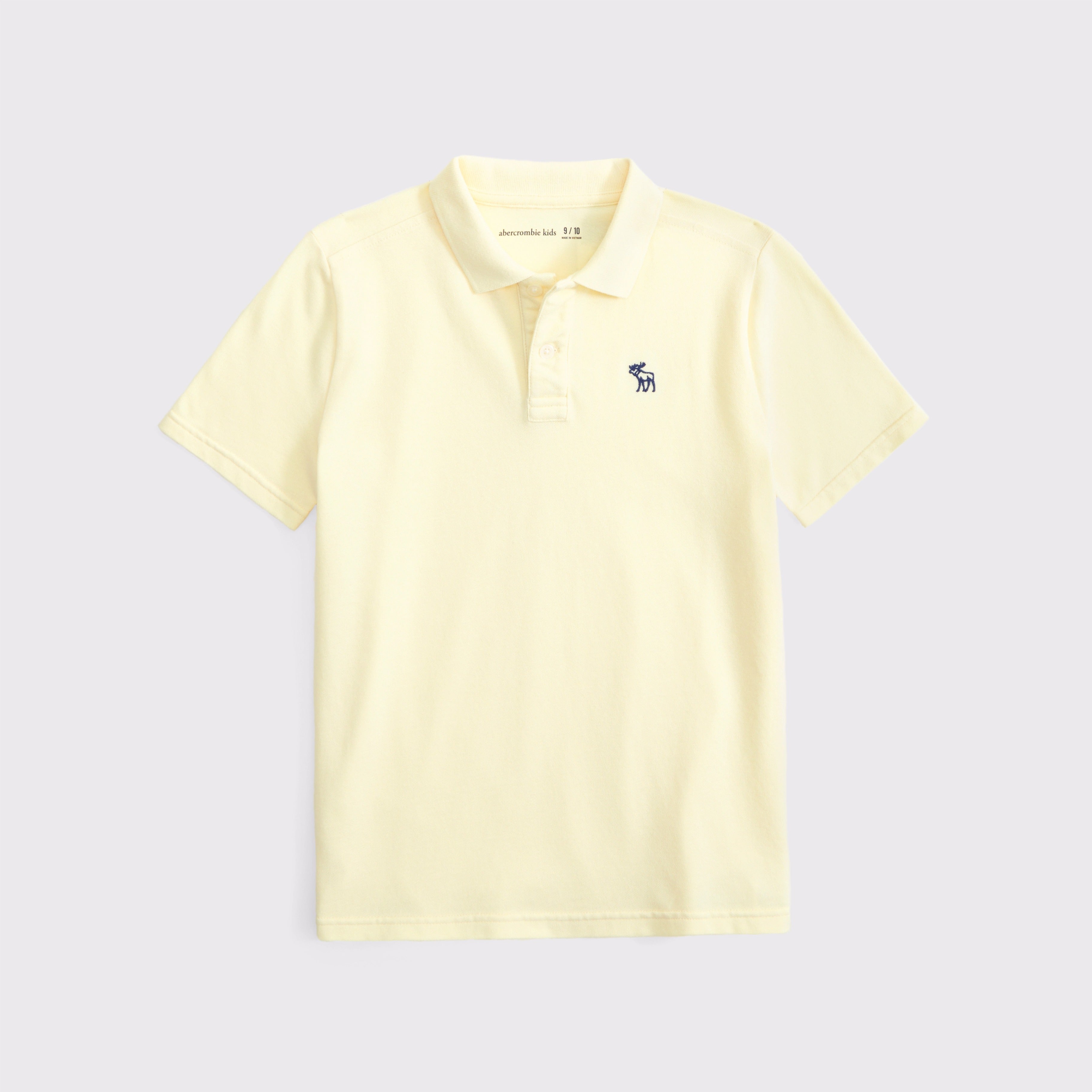 Chemise elástica unicolor con logo para niños