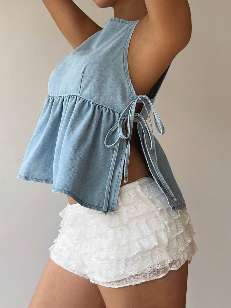 Top denim con lazos laterales