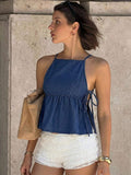 Top denim con lazos laterales