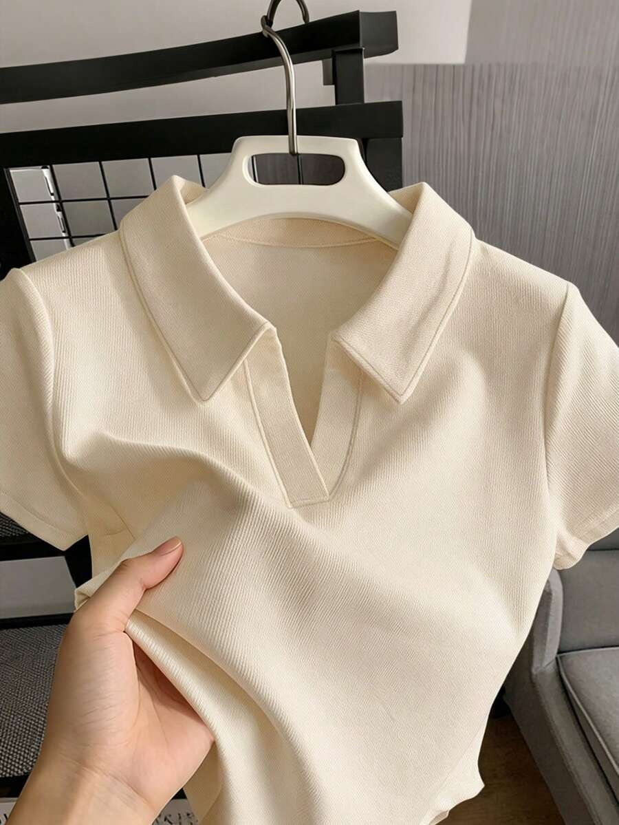Blusa casual cuello polo y manga corta