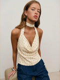 Blusa de satén con estampado de lunares