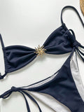 Bikini con textura y adorno de sol