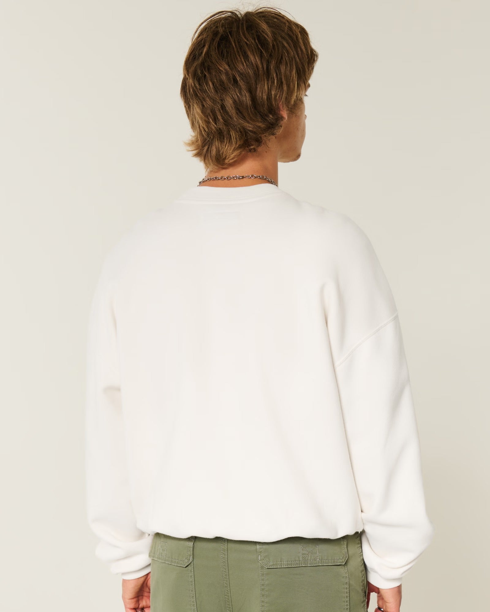 Sudadera holgada con bordado central