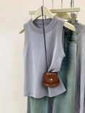 Blusa de punto sin mangas de cuello redondo