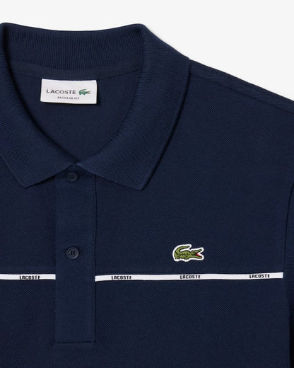 Chemise regular con linea central y logo