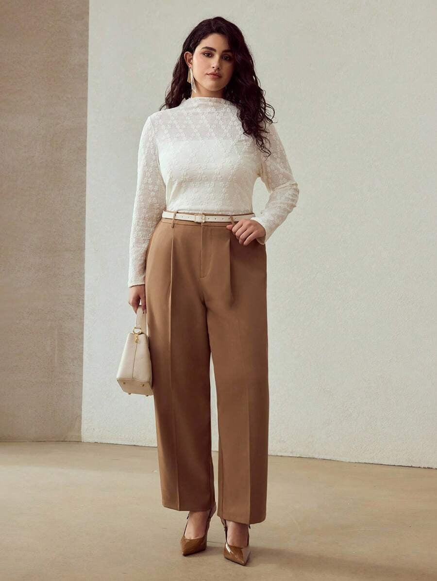 Blusa elegante de manga larga texturizada