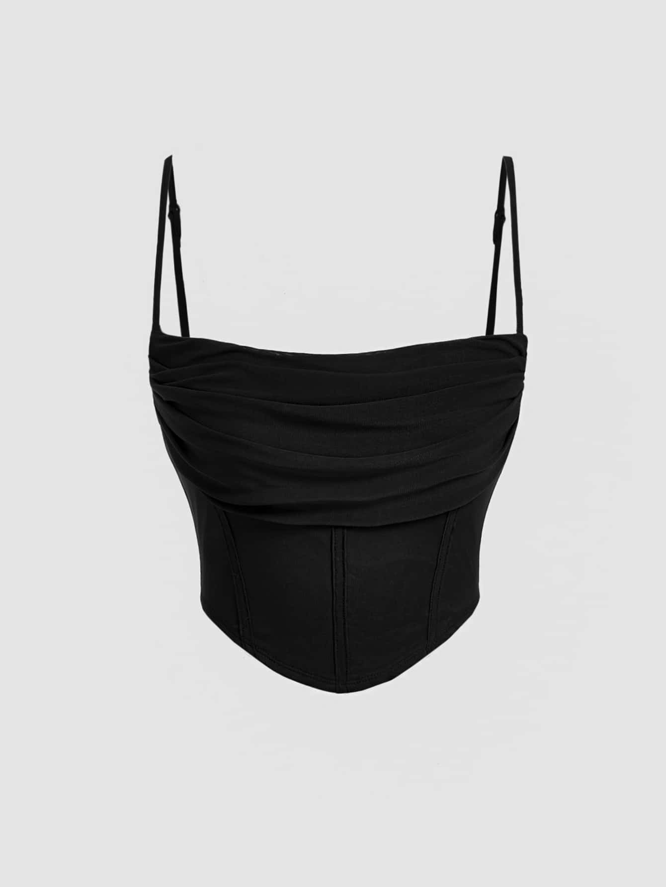 Top de dobleces sólidos y dobladillo asimétric