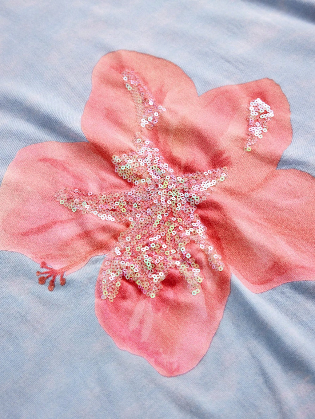 Franela estampado floral, bordado y cuentas