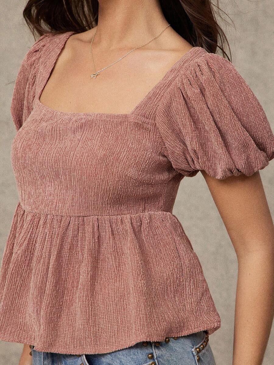 Blusa con volante