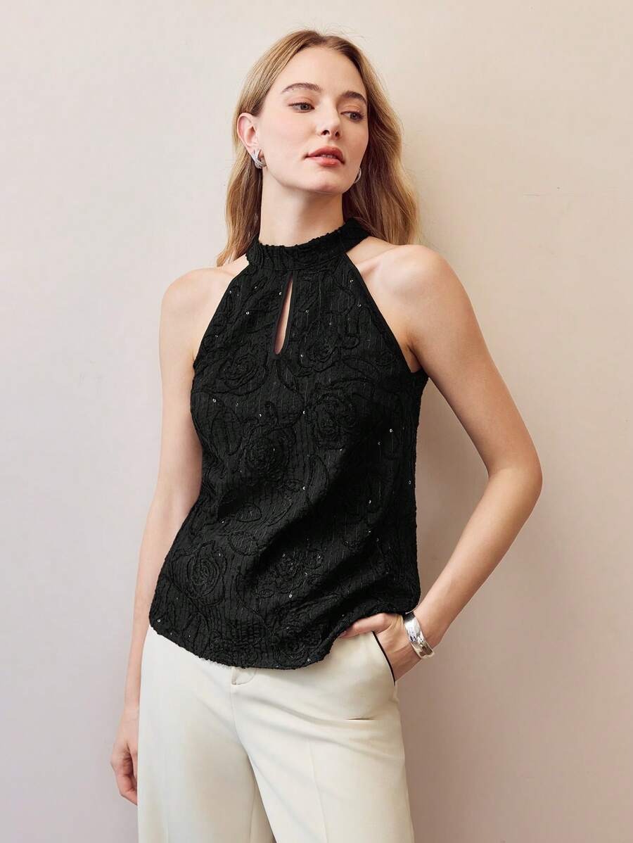 Blusa sin mangas patrón floral bordado y contraste con lentejuelas