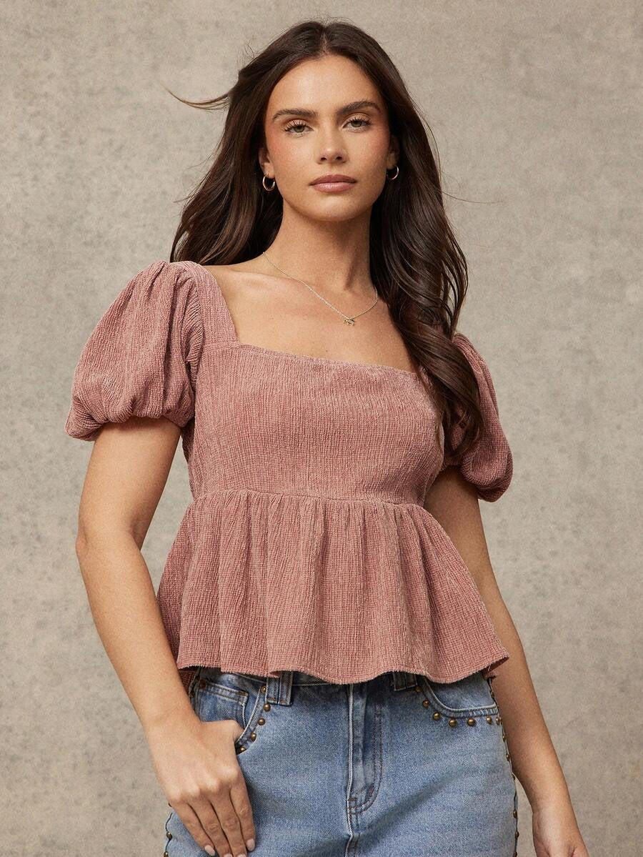 Blusa con volante