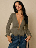 Blusa elegante cuello V y bordado floral