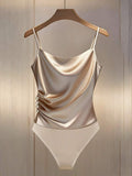 Body con cuello y adornos dorados