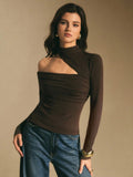 Blusa manga larga con cuello alto, recogida y abertura