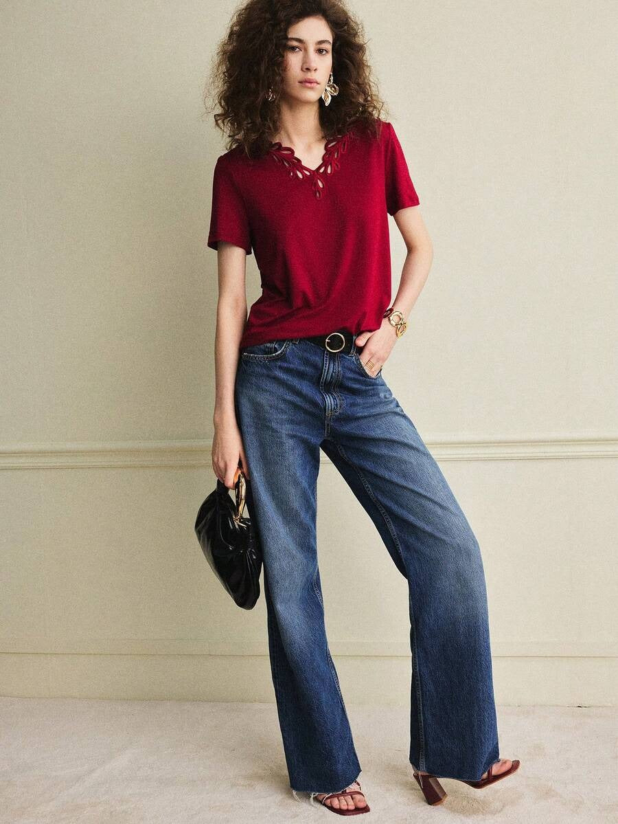 Blusa con diseño de ojal en el cuello
