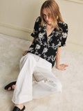 Blusa bordada con flores