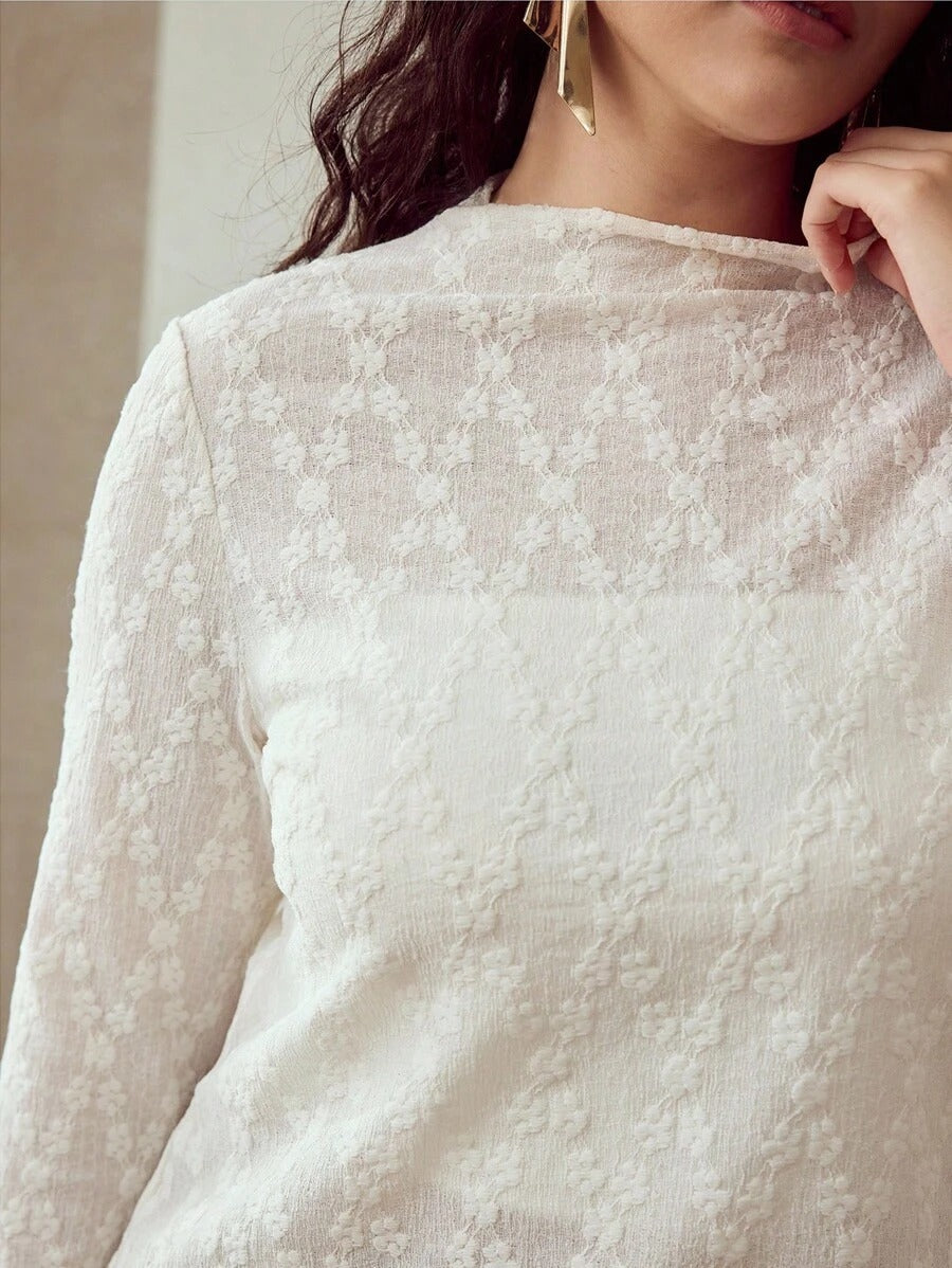 Blusa elegante de manga larga texturizada
