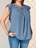 Blusa con encaje triangular