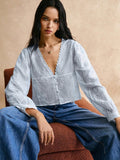 Blusa de manga larga con encaje floral