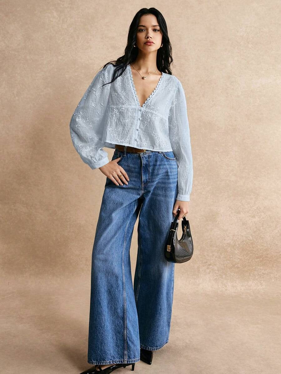 Blusa de manga larga con encaje floral