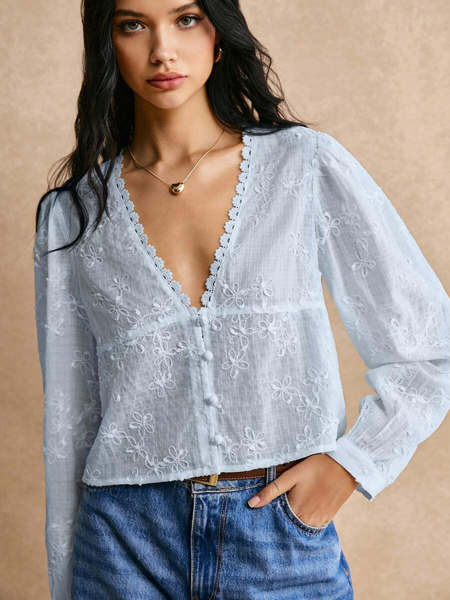 Blusa de manga larga con encaje floral