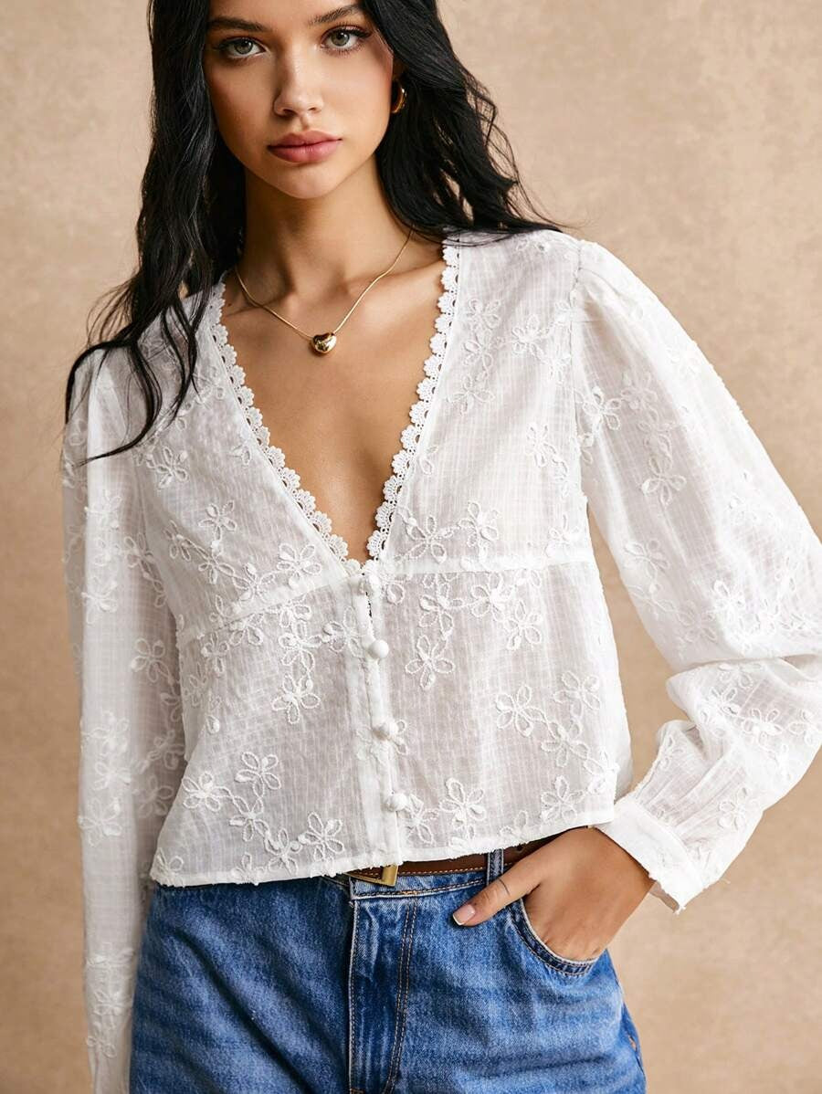 Blusa de manga larga con encaje floral