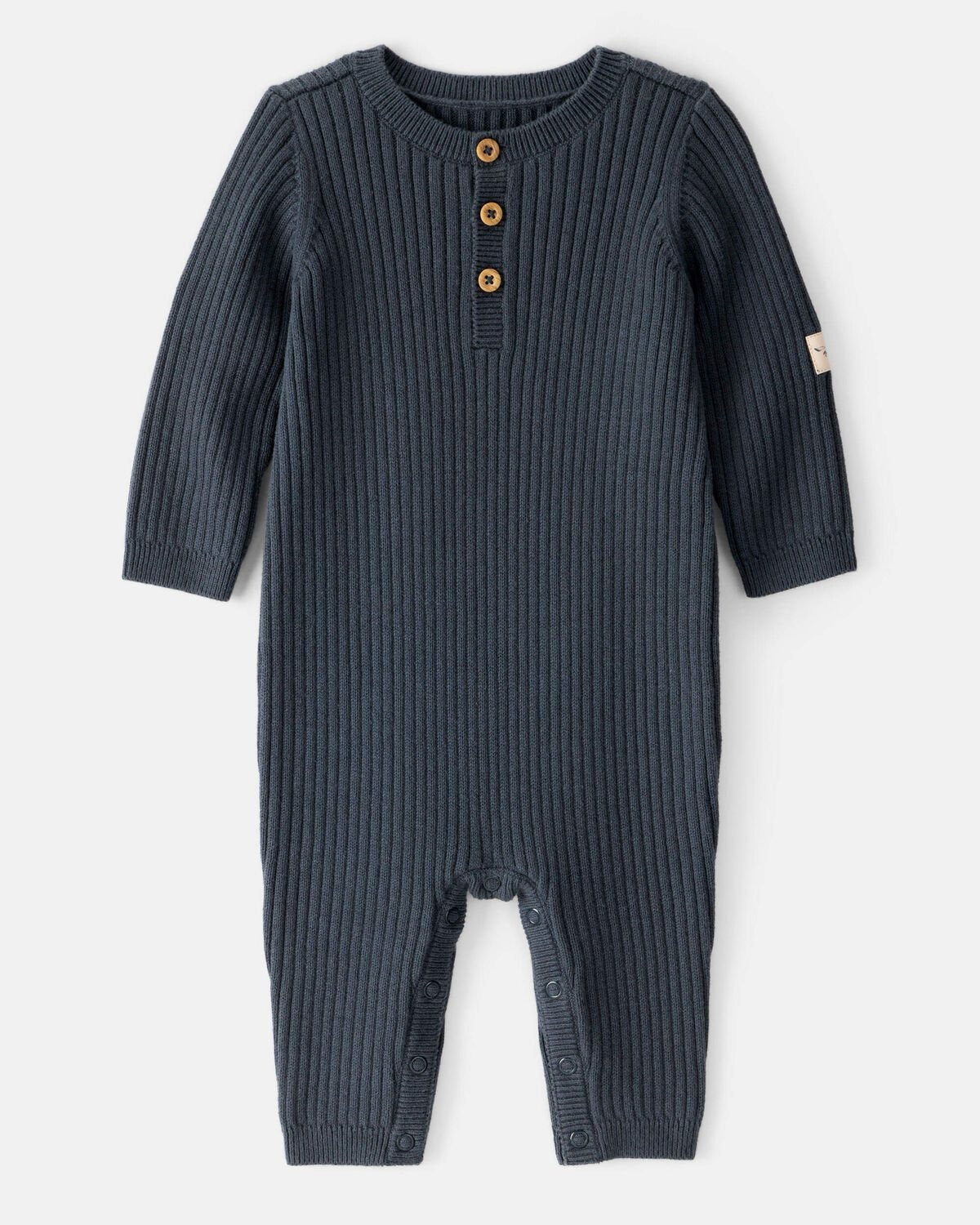 Body tipo braga unicolor con botones para niño