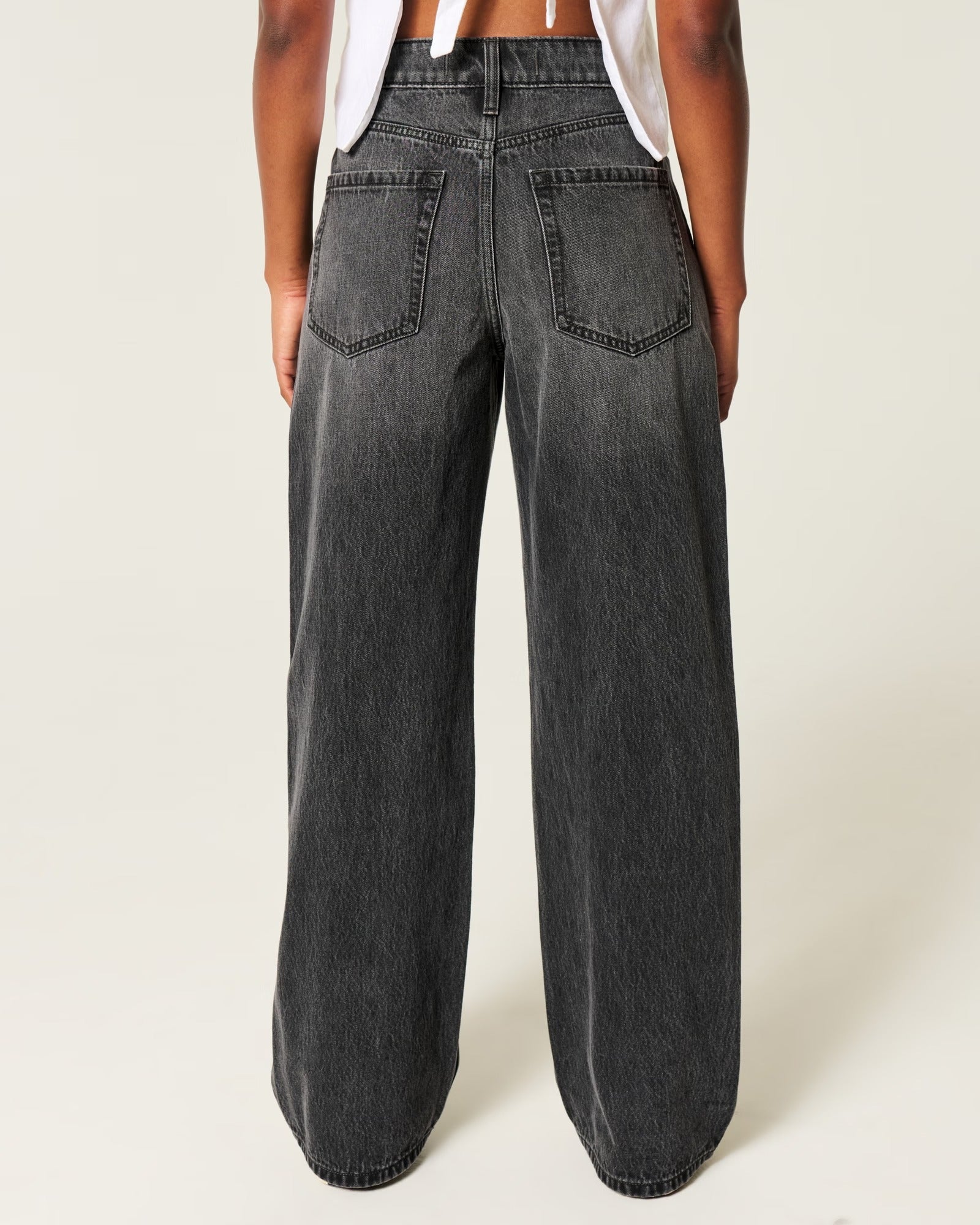 Jeans anchos de tiro alto con lavado