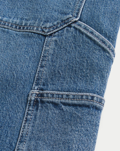 Bermuda denim con lavado medio y corte holgado