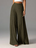 Pantalones anchos de cintura alta de tela texturizada elegantes