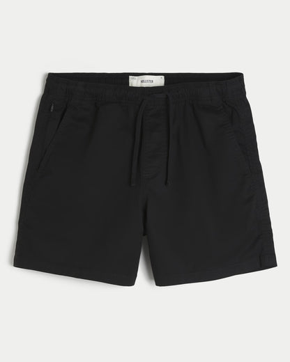 Shorts de sarga a medio muslo unicolor